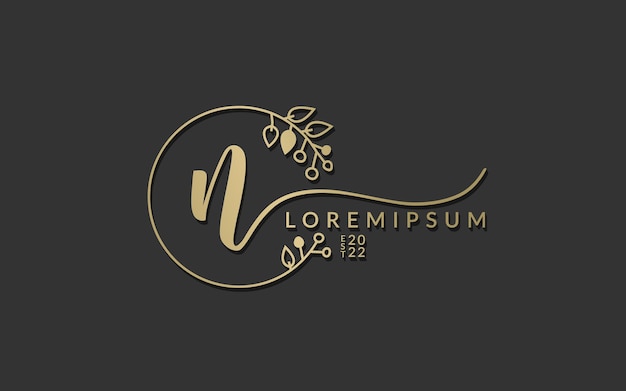 Elegant Golden Floral Monogram Logo on Dark Background | Jiffy Designs